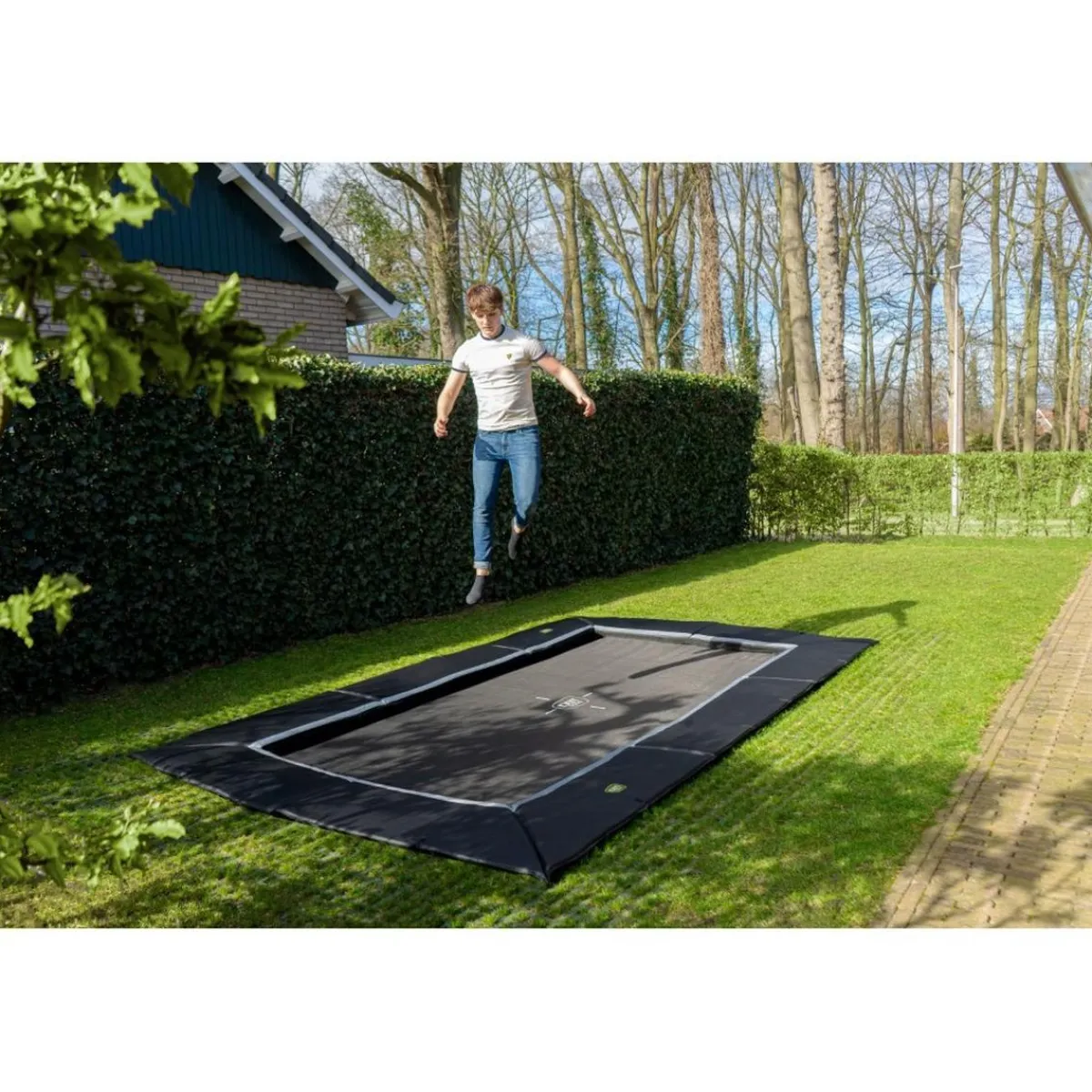 New Exit - Cama elástica de suelo Dynamic 244 x 427 cm negro con perímetro de seguridad Camas Elásticas